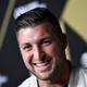 Image for article titled Tim Tebow And His Even Dirtier GQ Pictures
